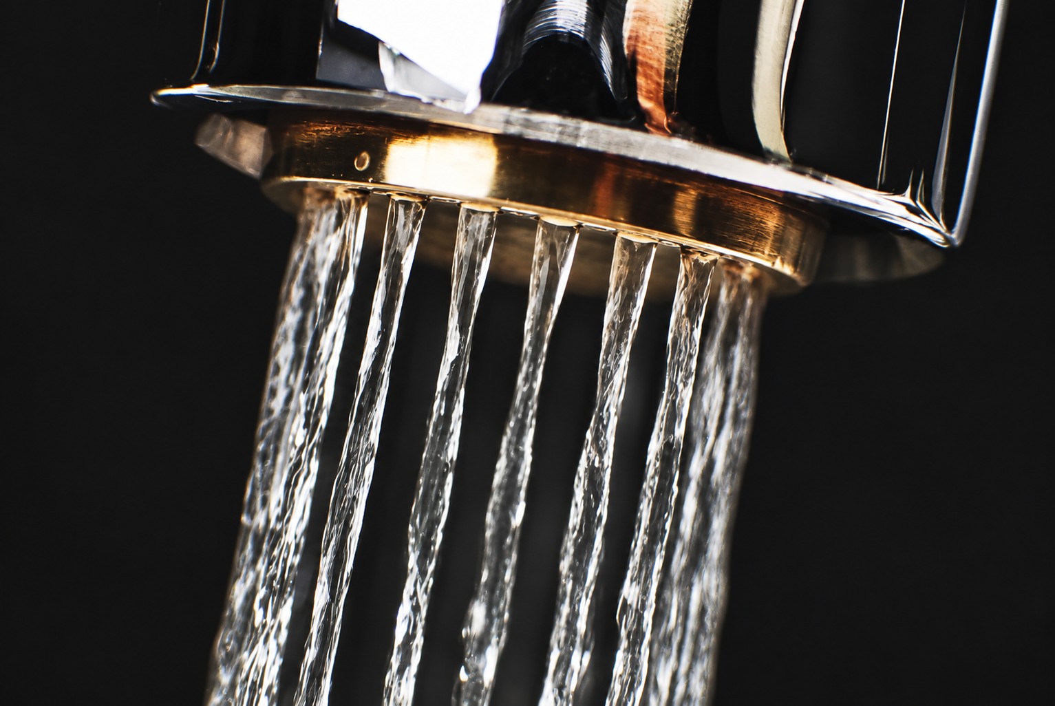 Close-up of water flowing through an Aabshar tap